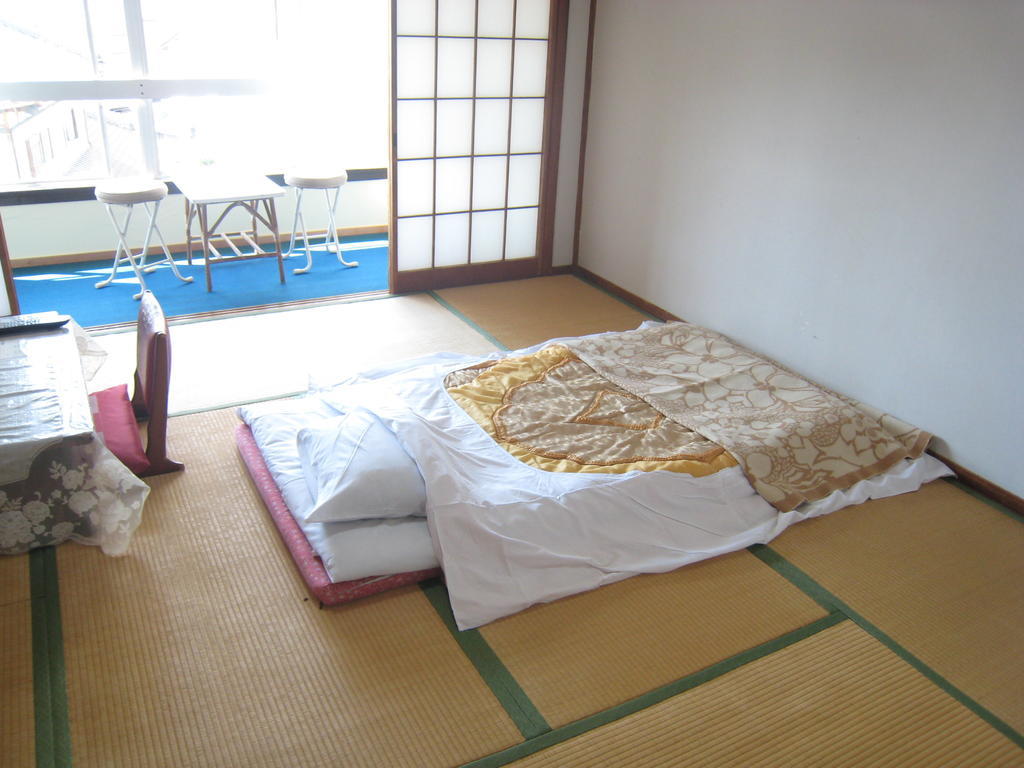 Kajiya Ryokan Futtsu Habitación foto